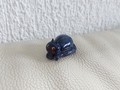 Miniature Petit chat bleu couché
