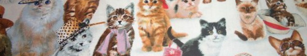 Tissu chats avec chapeaux 