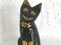 Petit chat noir décoré couleur or