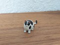 Miniature gros chat blanc et noir assis