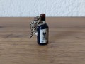 Miniature chat sur une bouteille