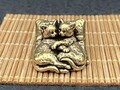 Miniature couple chats dormant