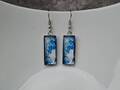 Boucles d'oreilles bleu avec chat blanc