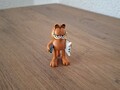 Chat Garfield avec coussin