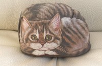 Coussin chat tigré butoir de fenêtre