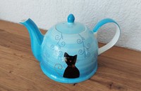 Théière bleu avec chat