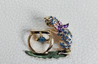 Brosche chat avec pierres bleu brillantes 