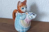 Théière chat en robe bleu avec théière