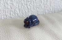 Miniature Petit chat bleu couché
