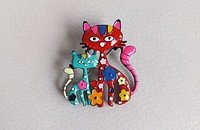 Broche chats rouge et turquois émaillé