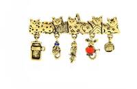 Broche 5 chats avec accessoires or
