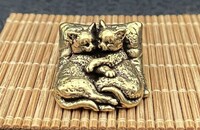 Miniature couple chats dormant
