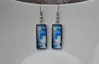 Boucles d'oreilles bleu avec chat blanc