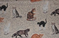 Tissu beige avec chats