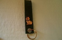 Porte-clés vert avec chat orange