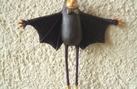 Chat Halloween déguisé en chauve-souris