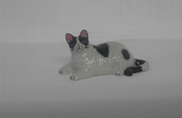 Miniature "Gros chat blanc et noir couché"